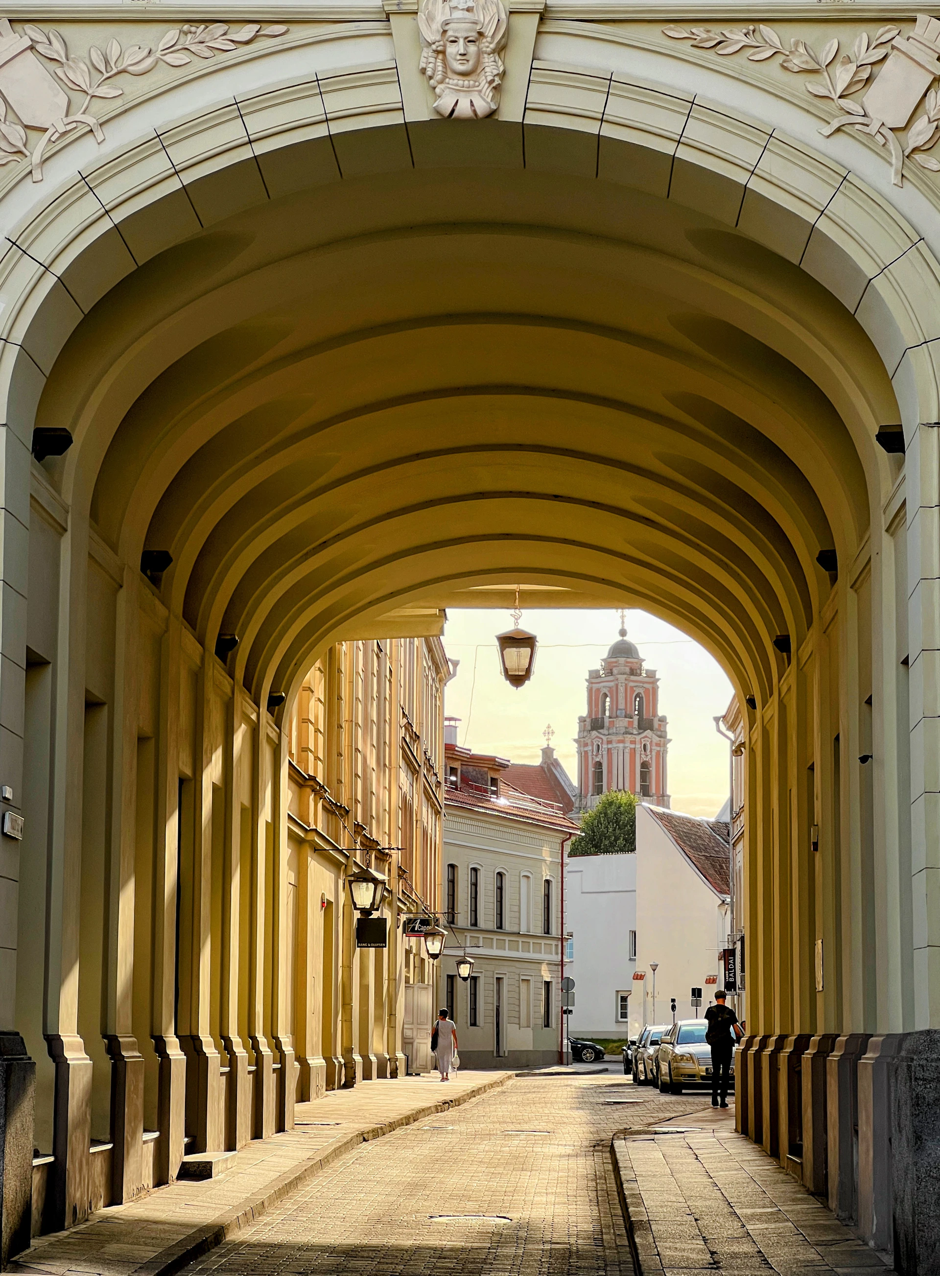 a walkway with a building in the background
