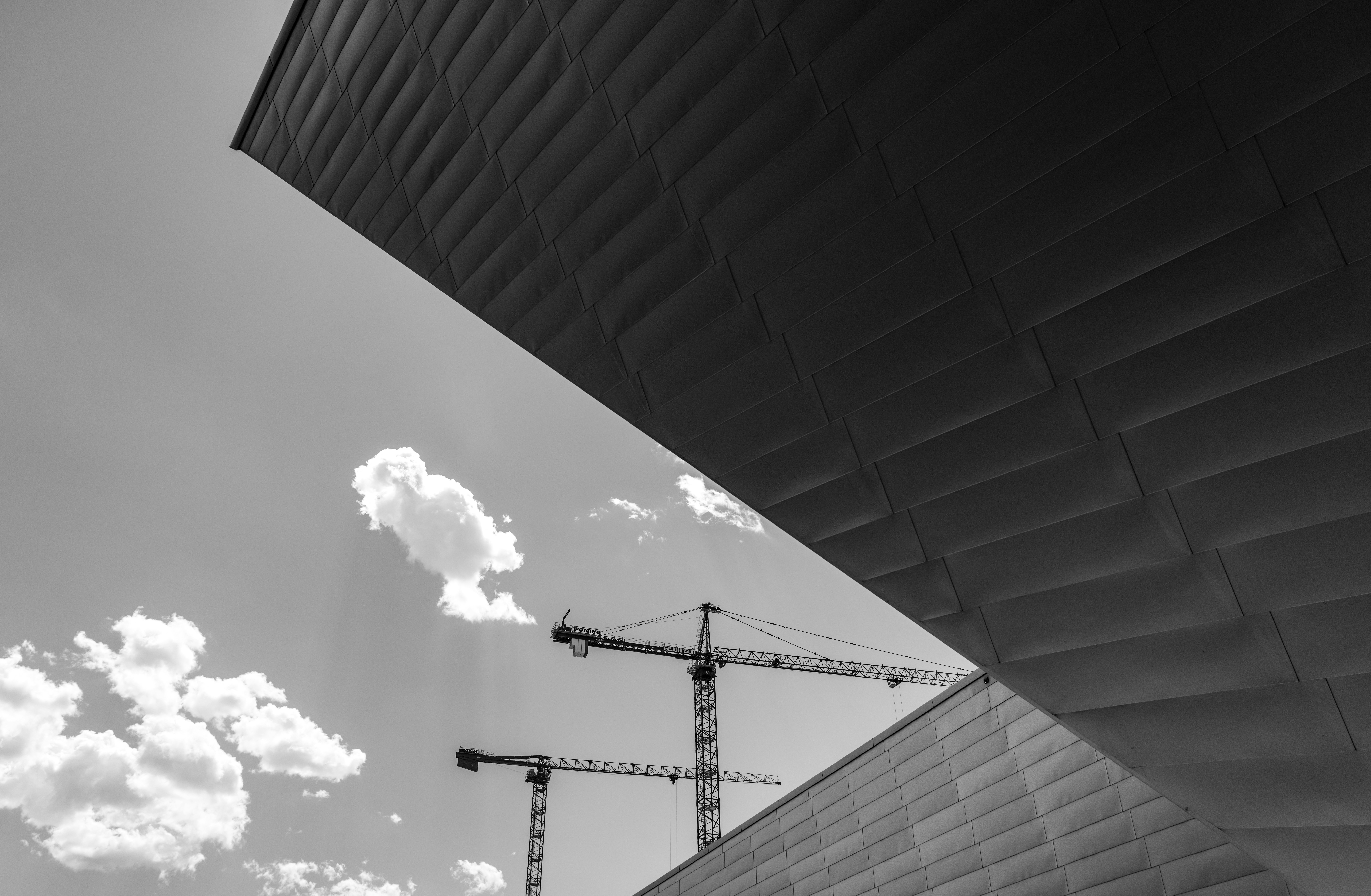 a large metal structure with smoke coming out of it