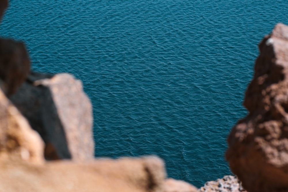 a view of the ocean from the top of a cliff