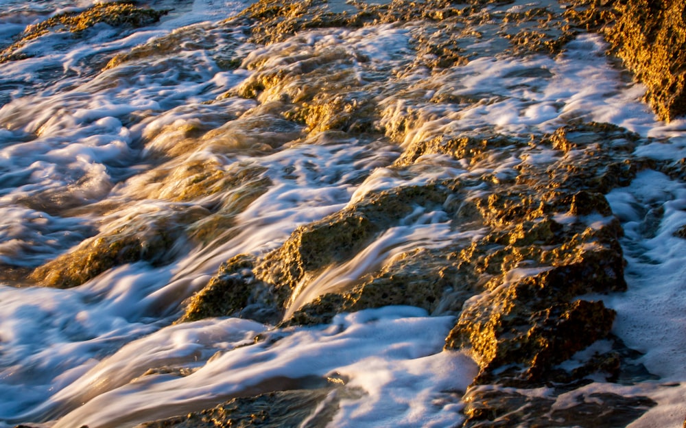 a stream of water with rocks