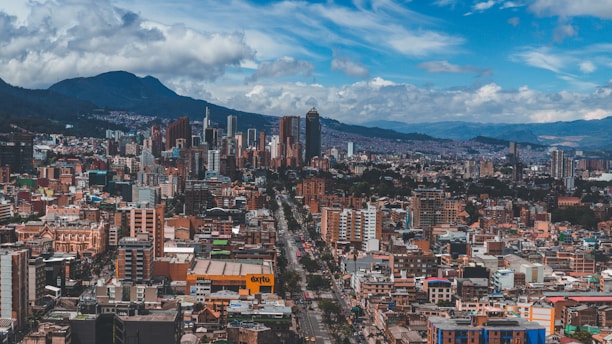 a city with mountains in the background
