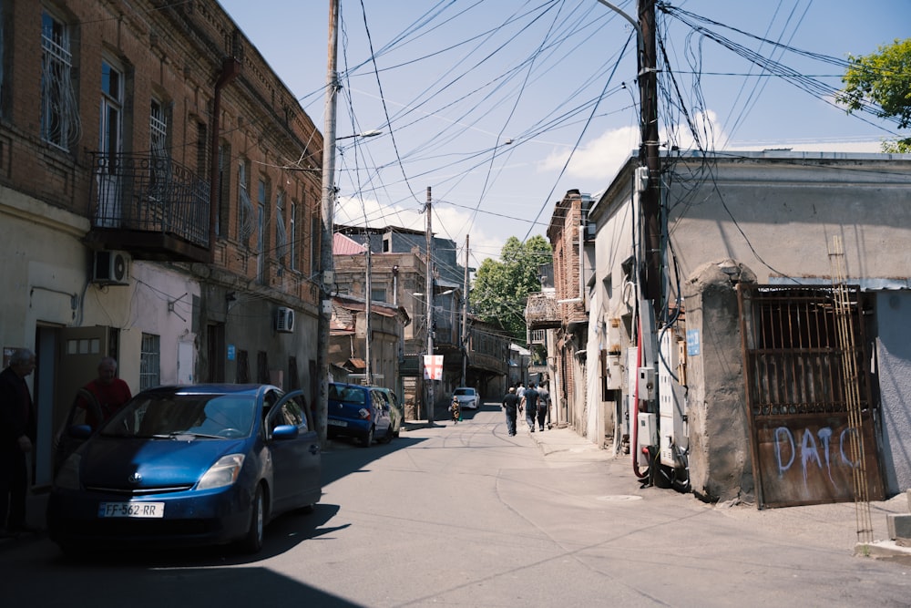 a street with cars and buildings on either side of it