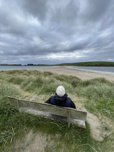a person sitting on a bench