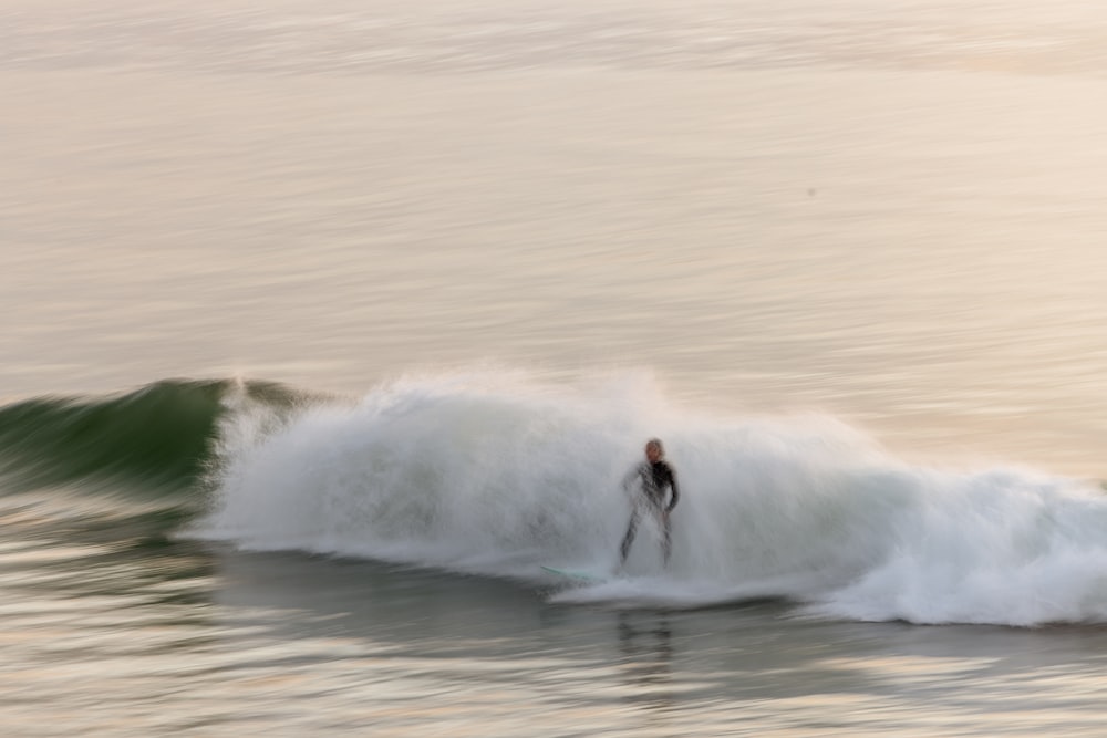 a surfer riding a wave