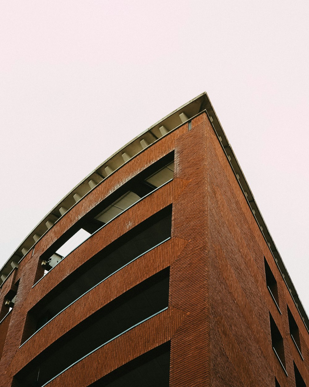 a tall building with a glass front