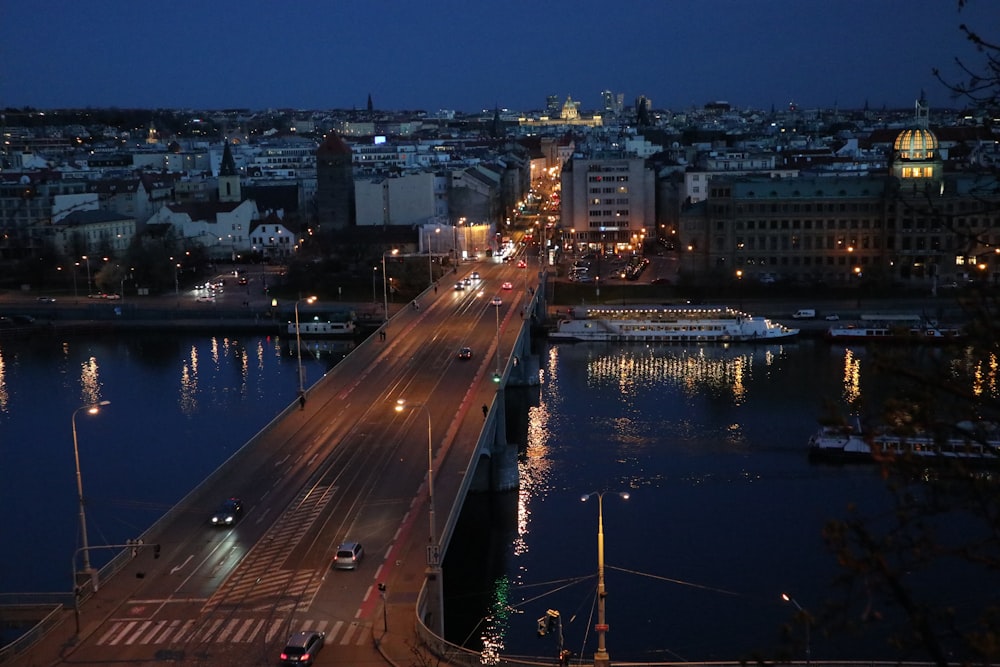 a bridge over a river with buildings on either side of it