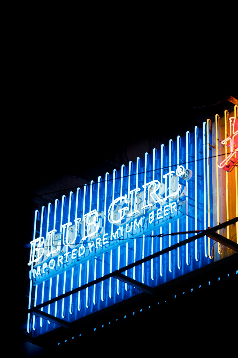 a lighted sign at night