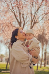a person holding a baby