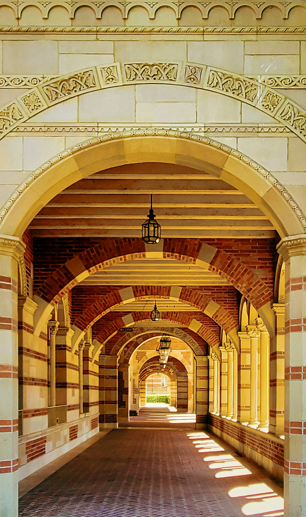 a hallway with a ceiling and arches