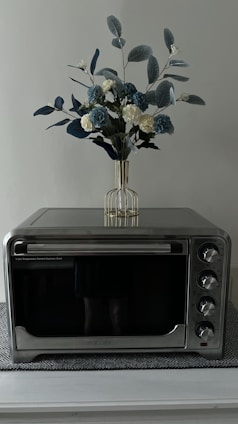 A stylish microwave oven on a countertop.