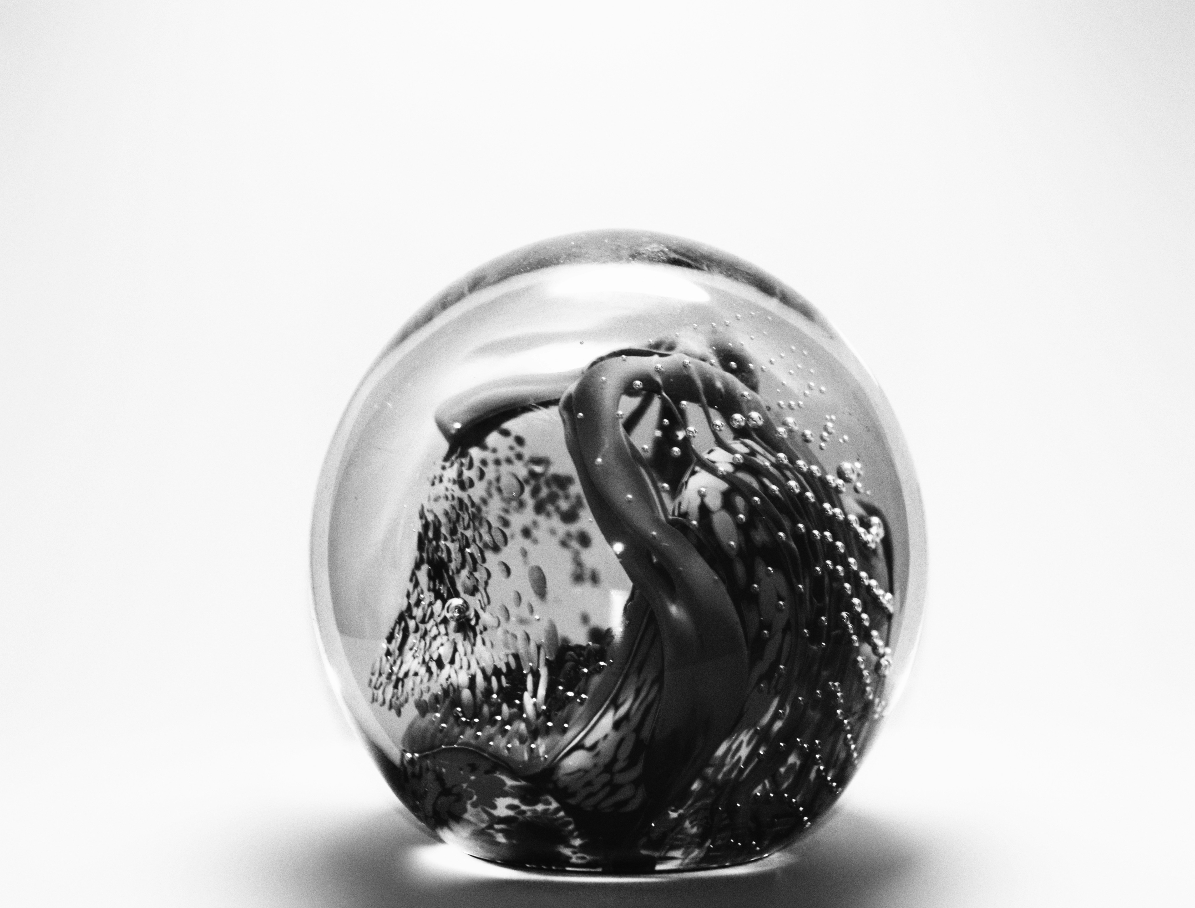 a silver ring with a black stone
