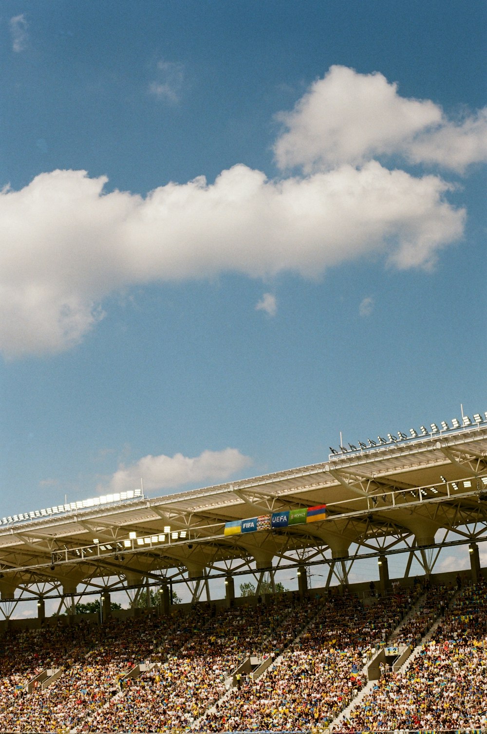 a large stadium with a large crowd