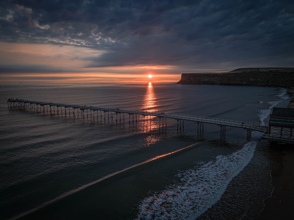 a dock on a beach