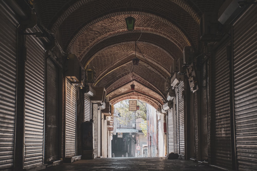 a hallway with a large arched ceiling