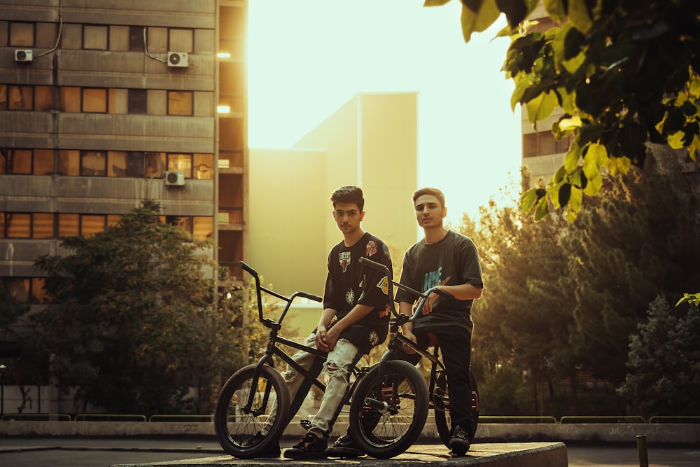 two men on a bicycle