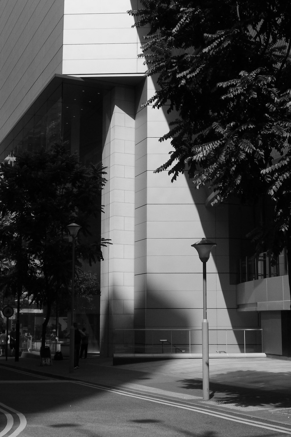 a street with a building on the side