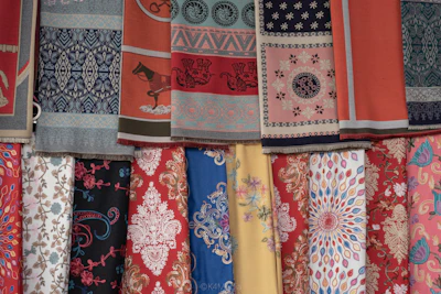 A vibrant display of 10x vastra studio's ethnic wear collection, showcasing intricate patterns and rich fabrics.