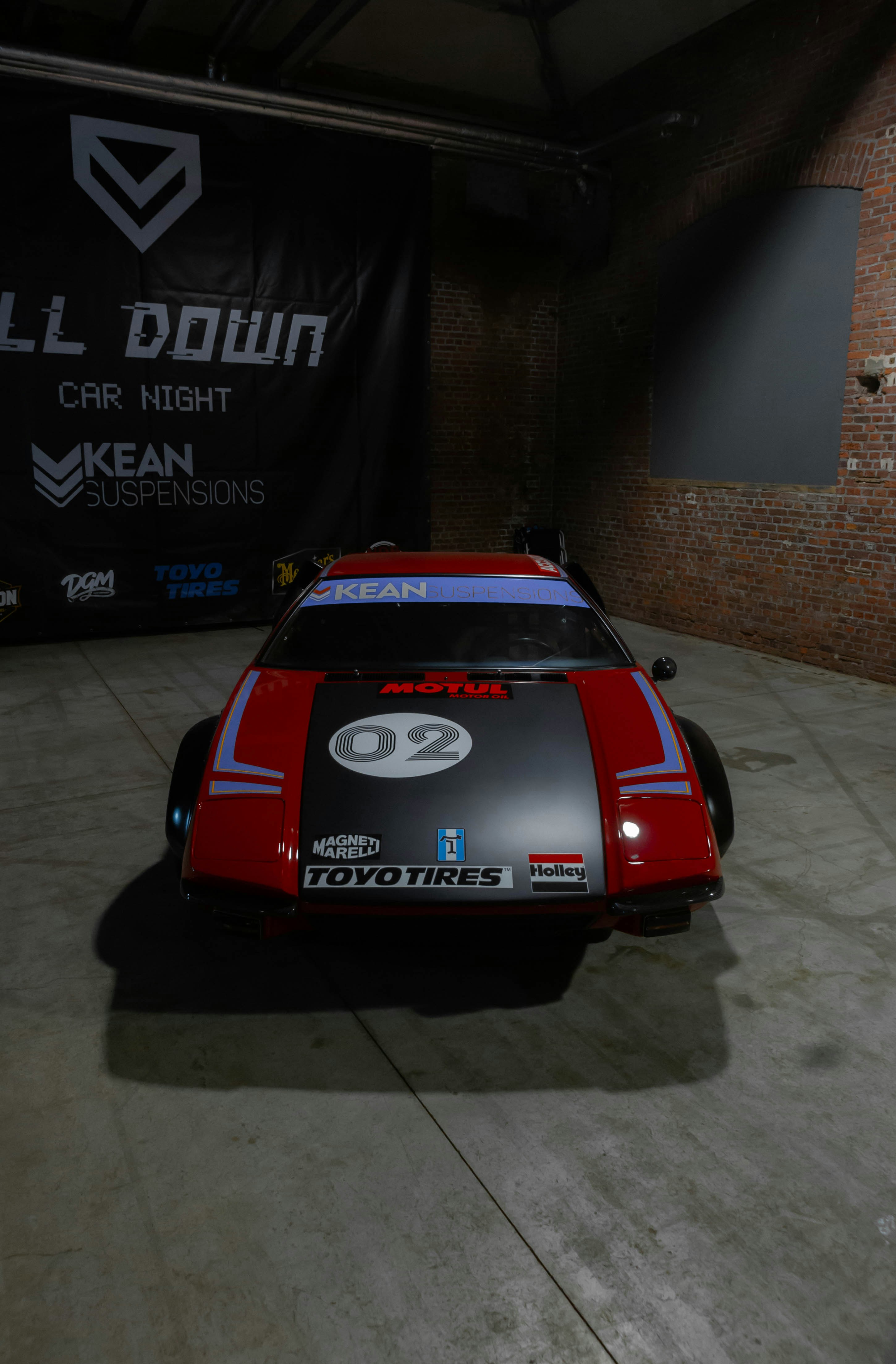 A red race car photo – Free Belgium Image on Unsplash