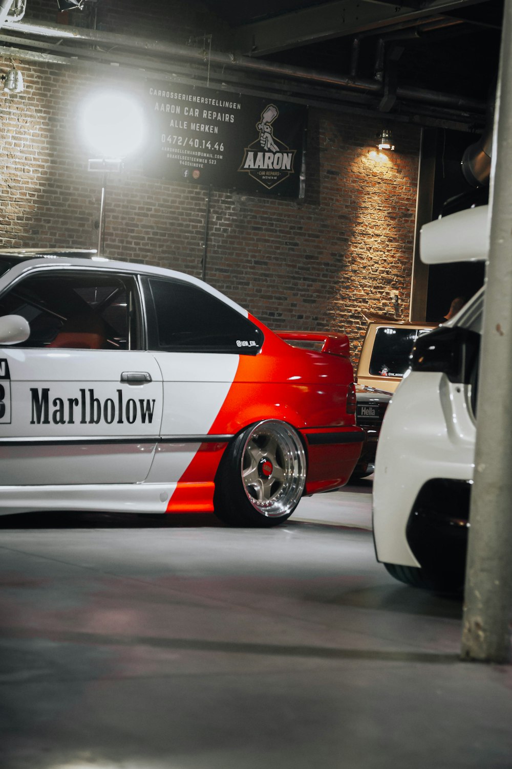 a white car parked in a garage