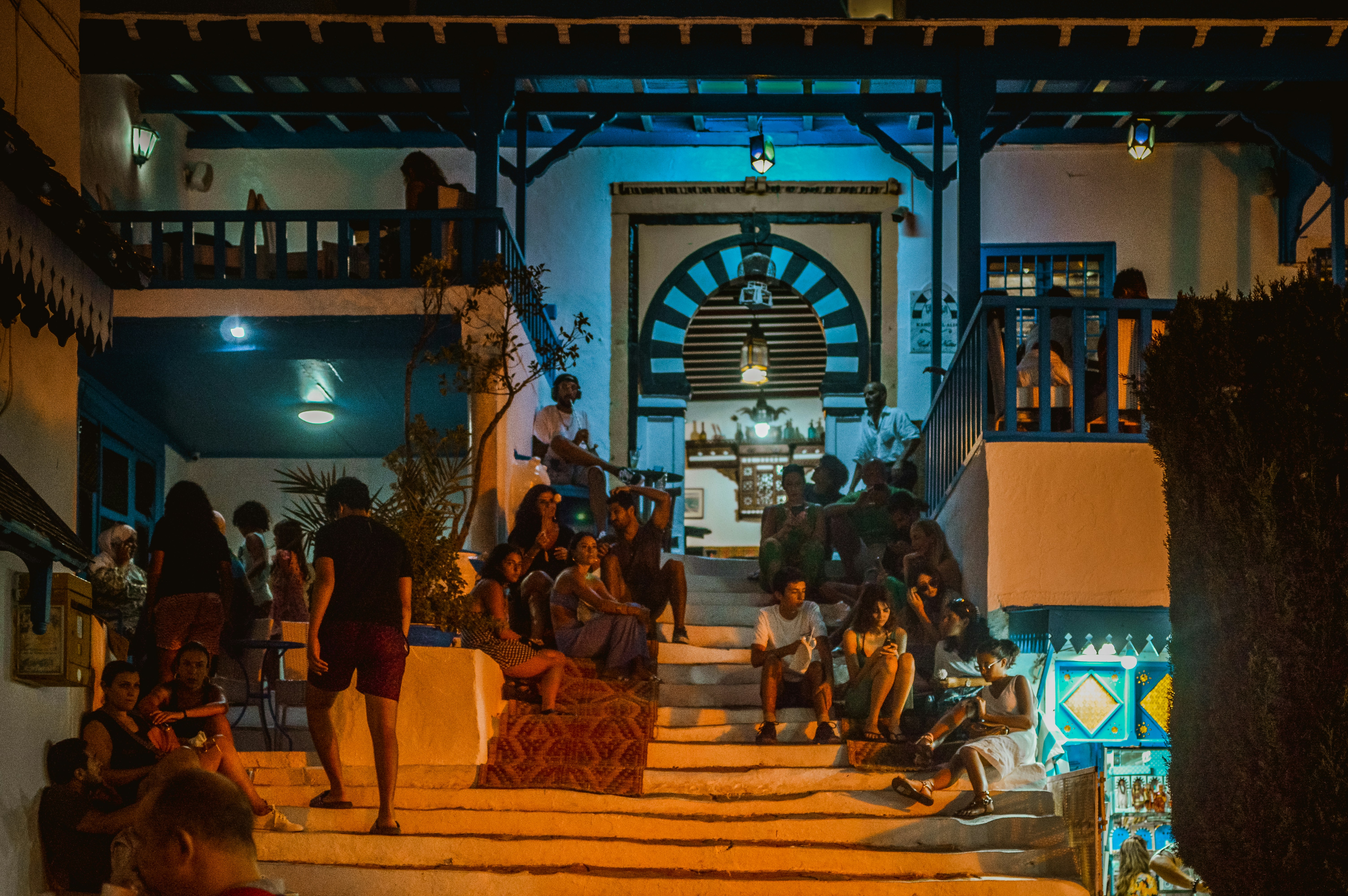 a group of people sitting on stairs
