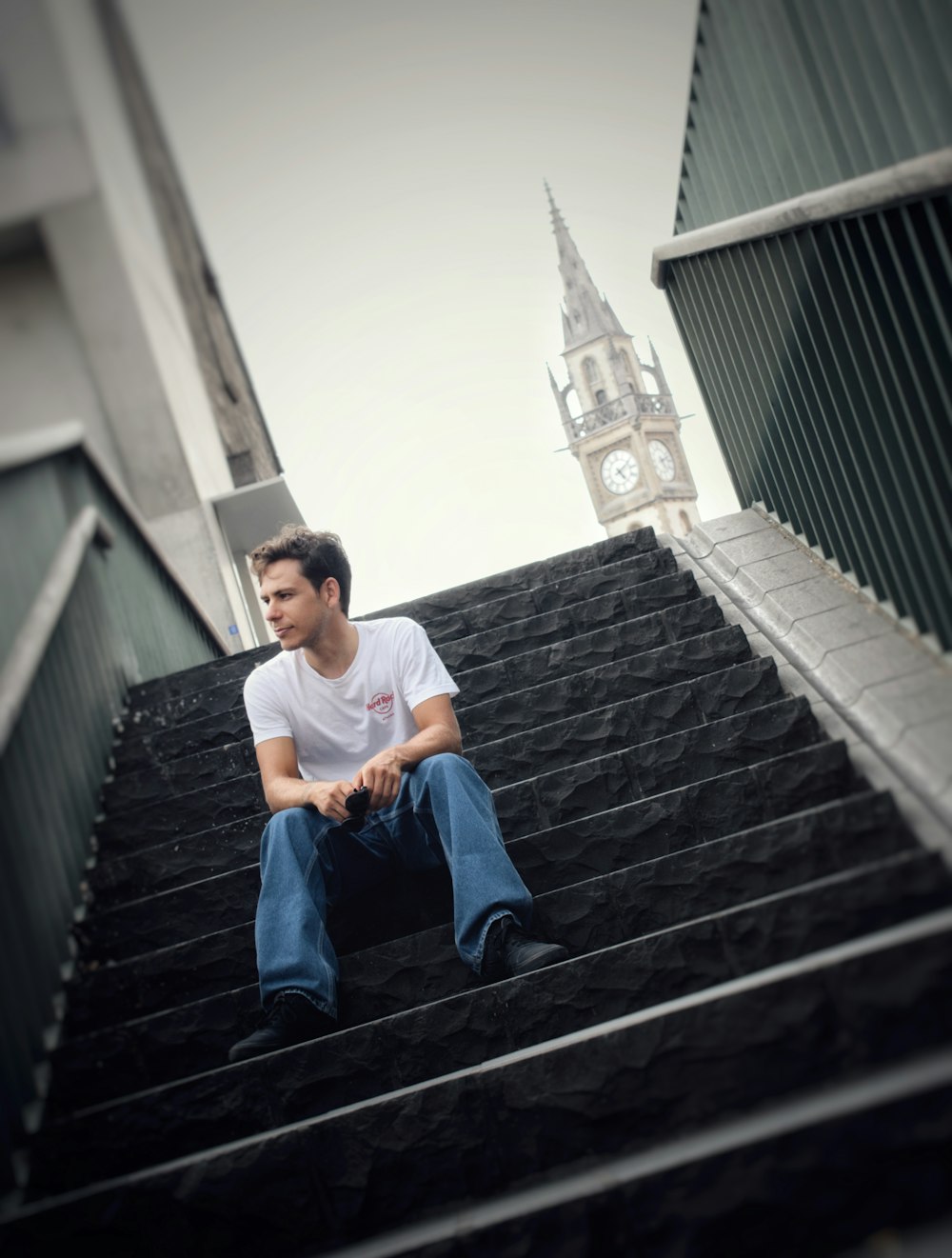 a man sitting on a staircase