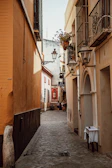 a narrow alley between two buildings