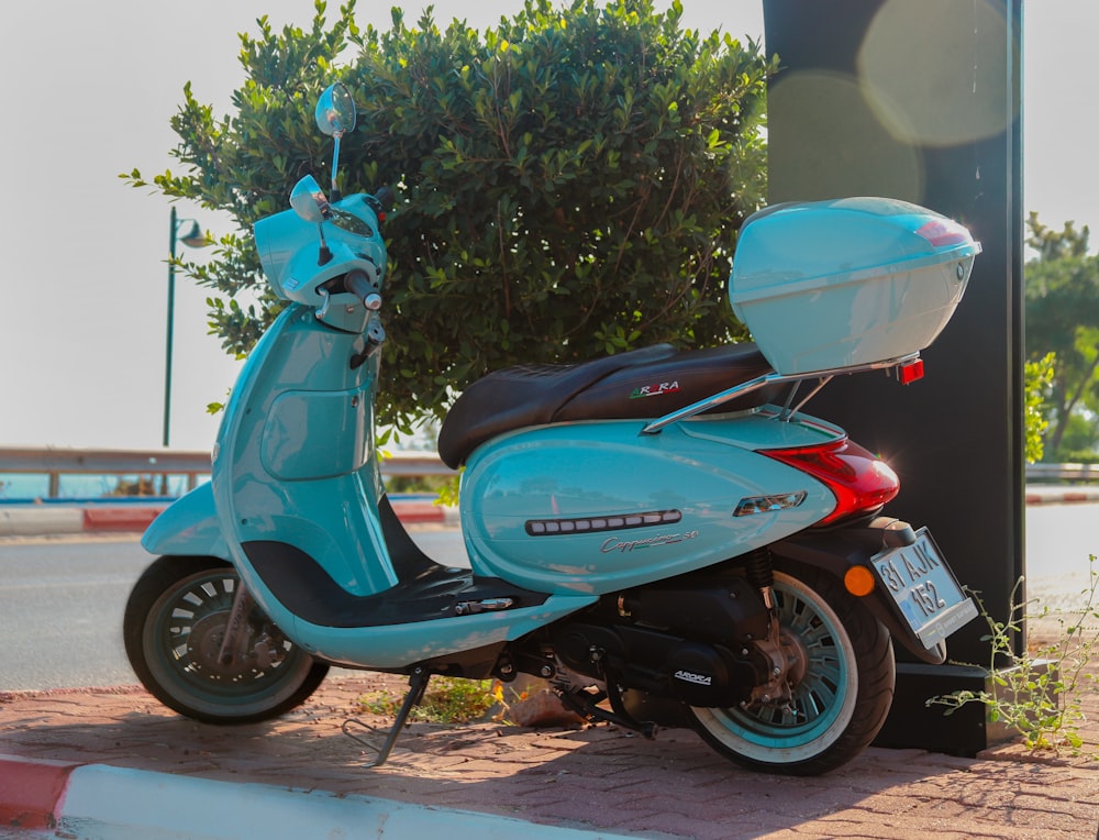 a blue and white scooter