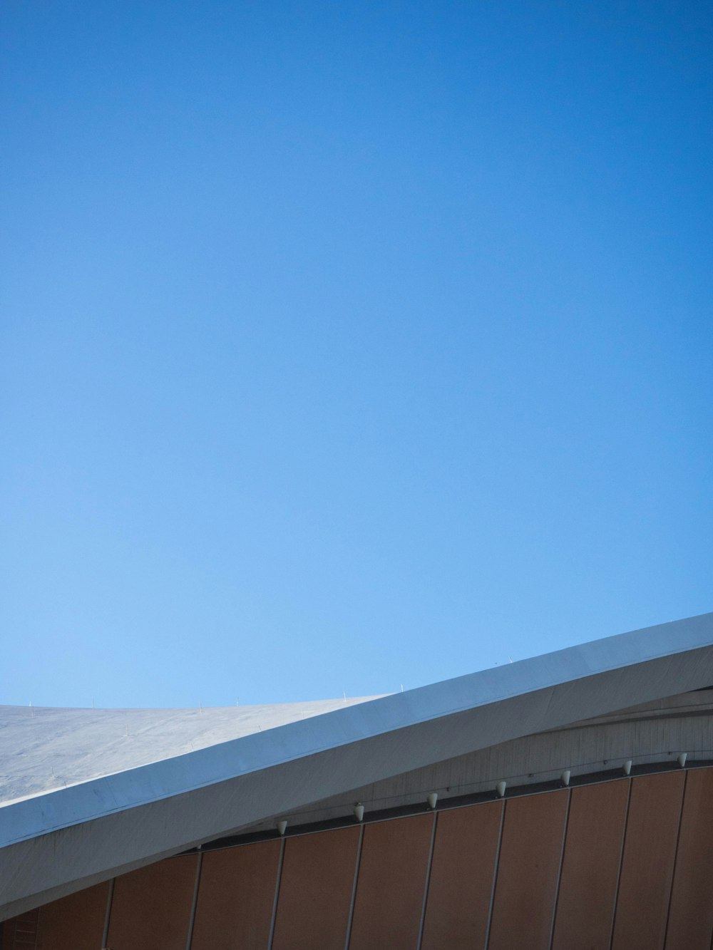 a roof with a blue sky