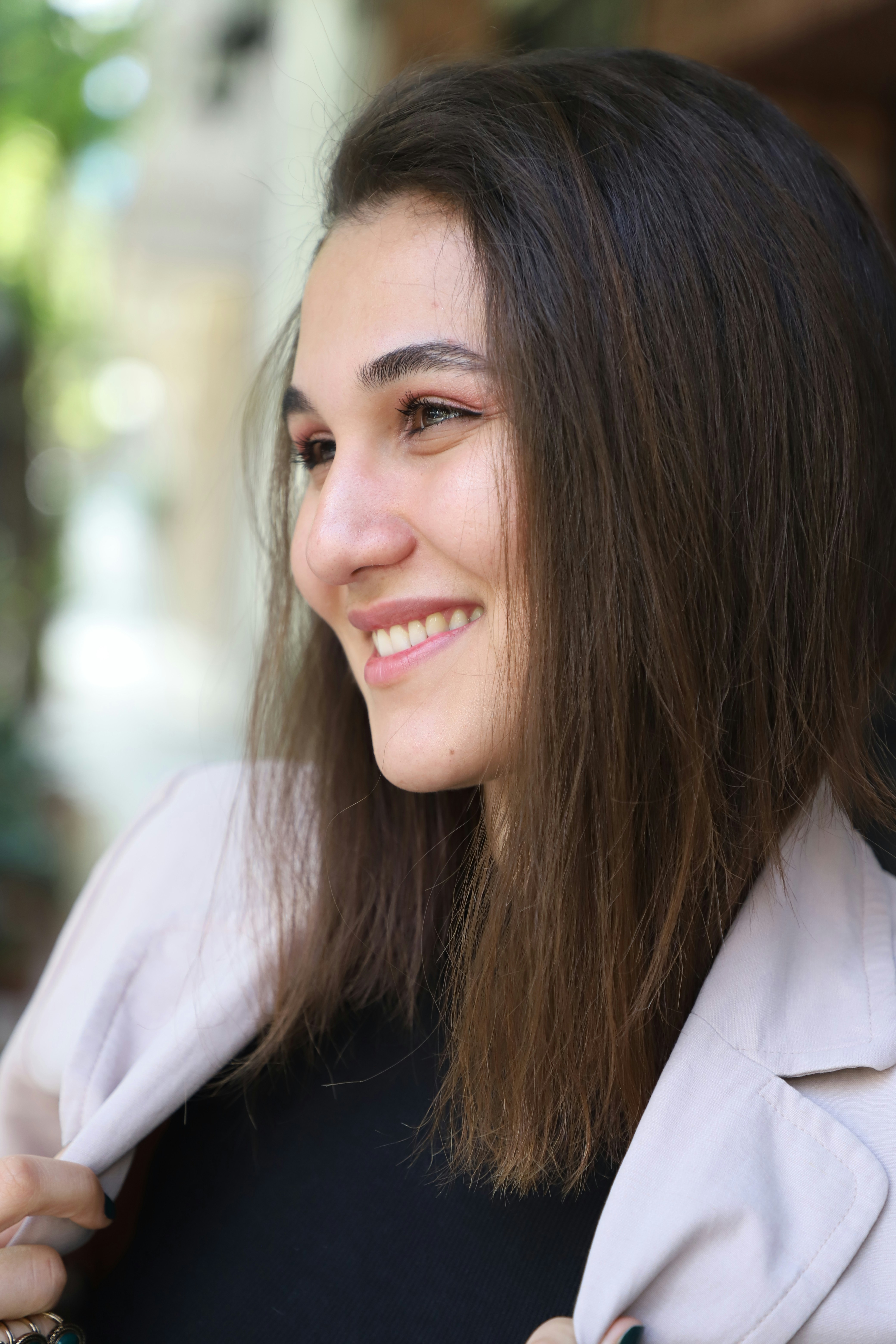 a woman smiling at the camera