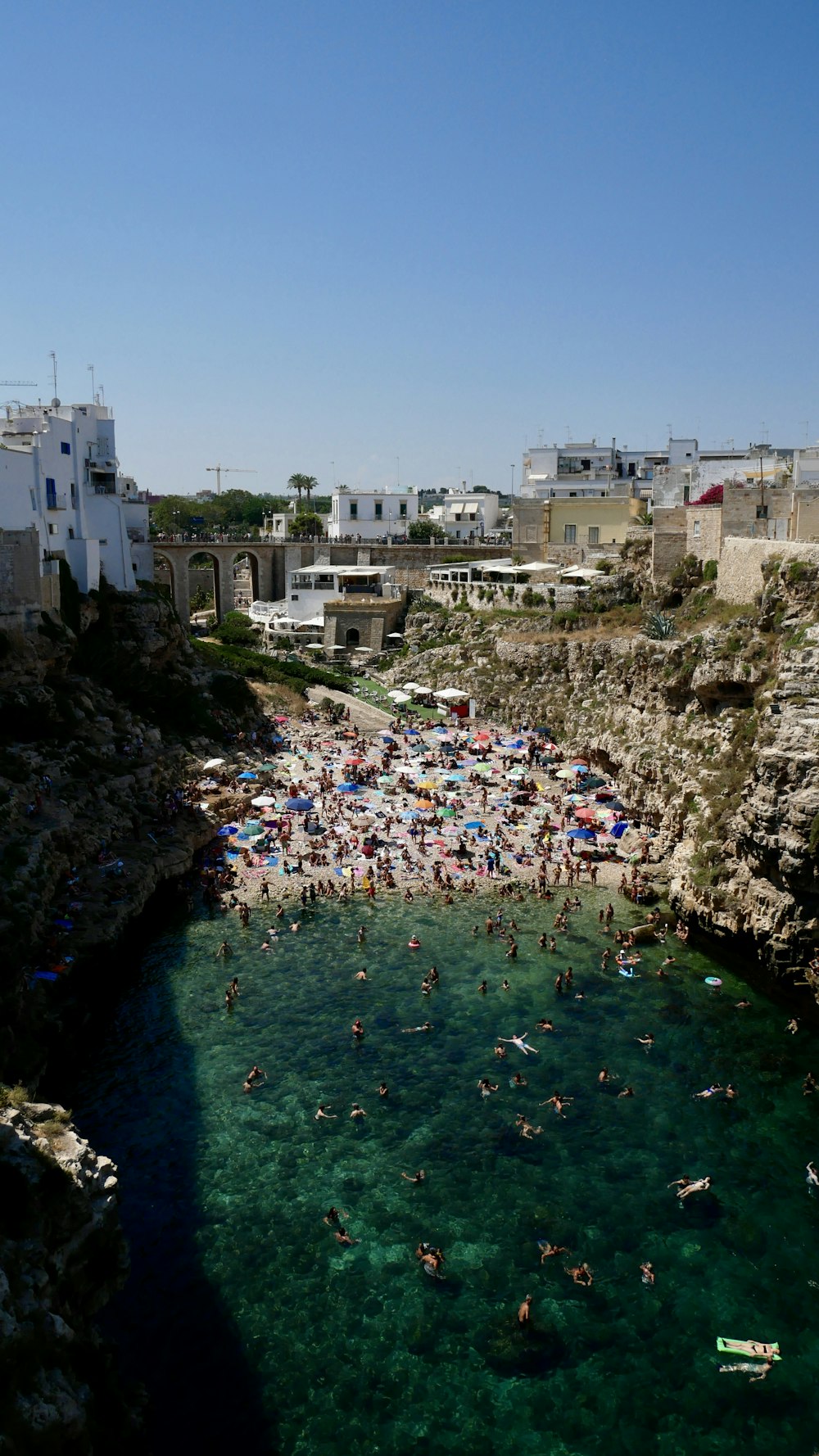 a large crowd of people at a beach