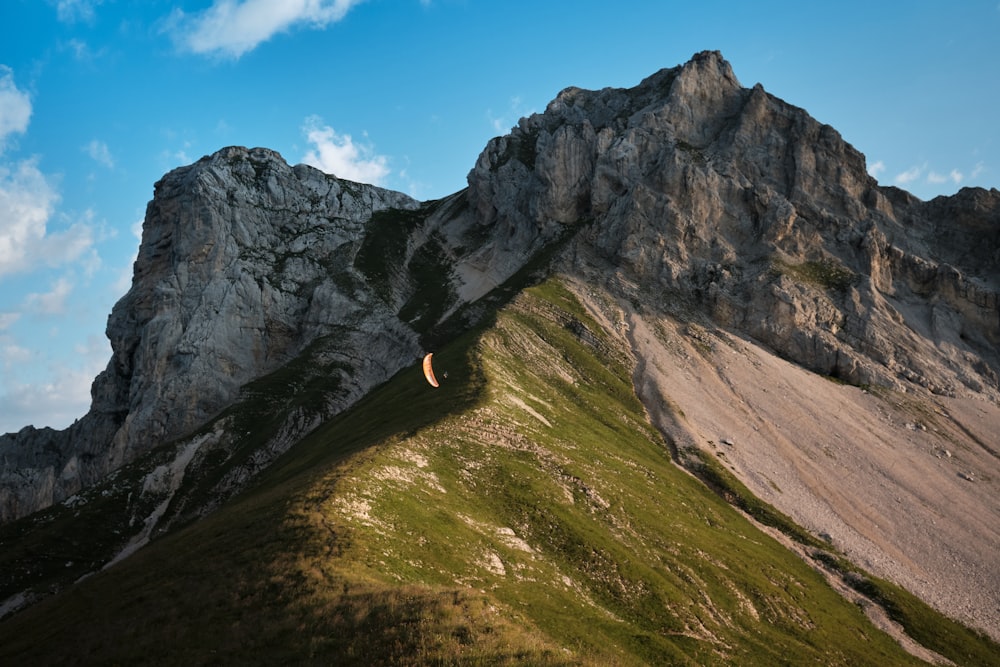 a person walking on a mountain