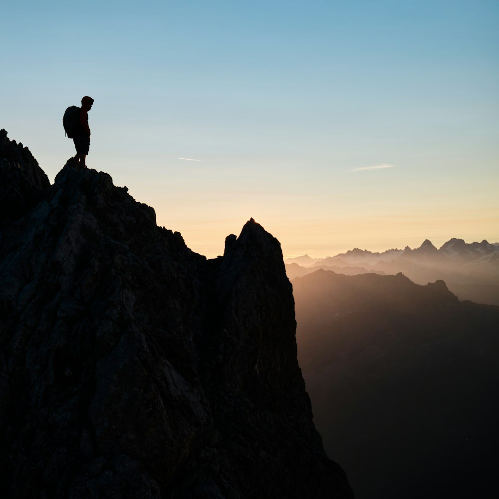 a person standing on a mountain
