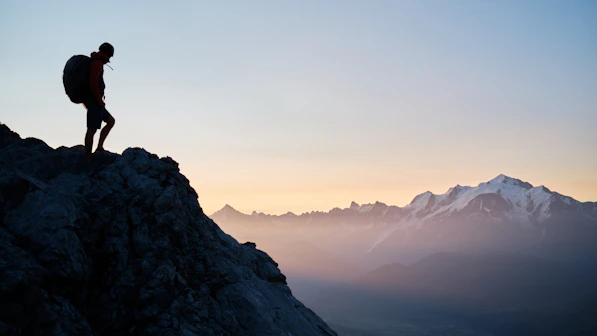 a man standing on a mountain