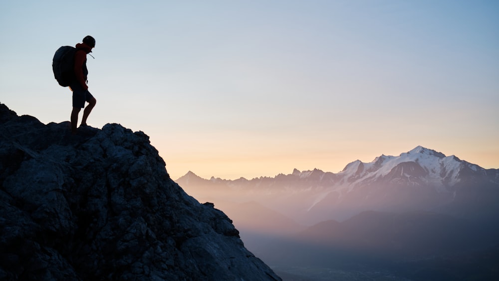 a man standing on a mountain