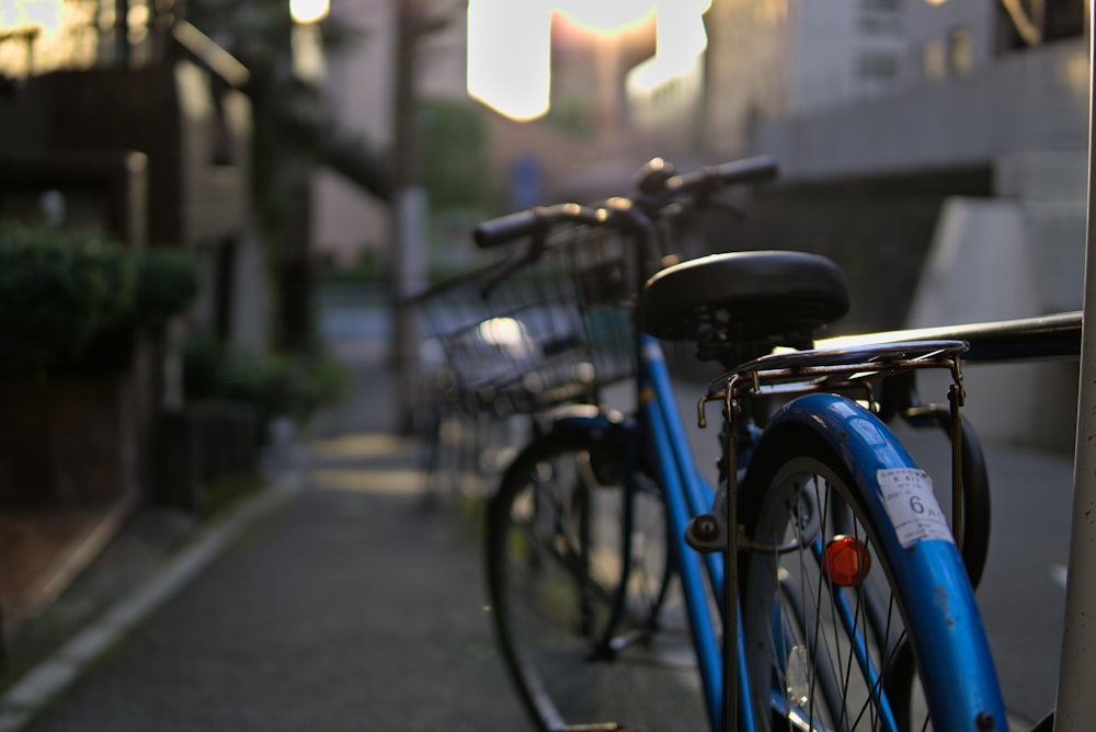 a bicycle parked on a sidewalk