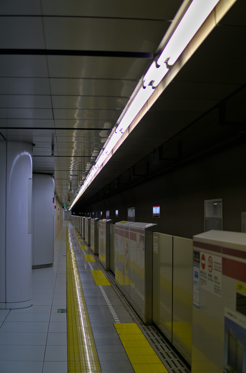 a long hallway with white walls