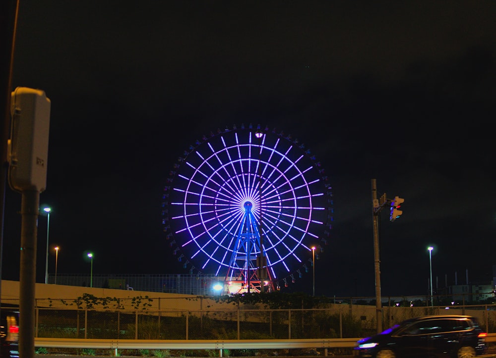 a ferris wheel at night