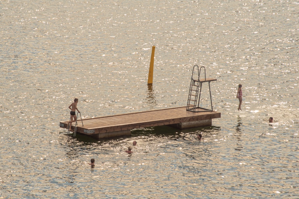 a group of people on a dock