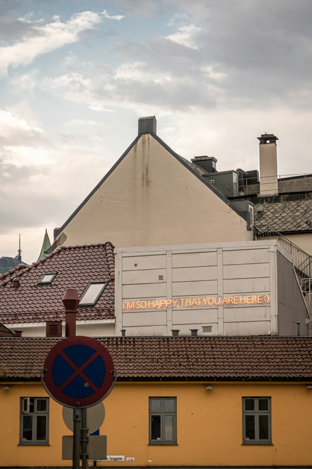 a sign in front of a building