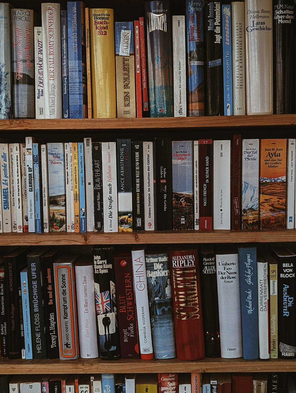 a shelf with many books on it