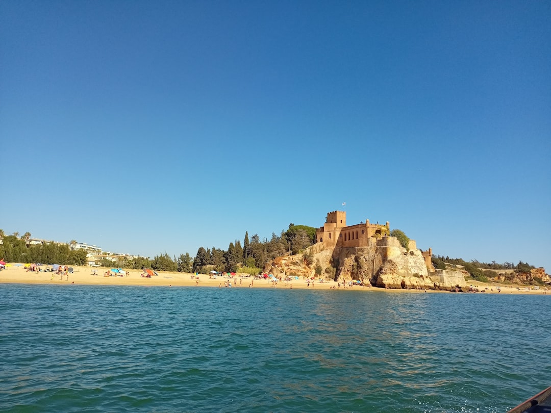 a rocky island with a castle on it