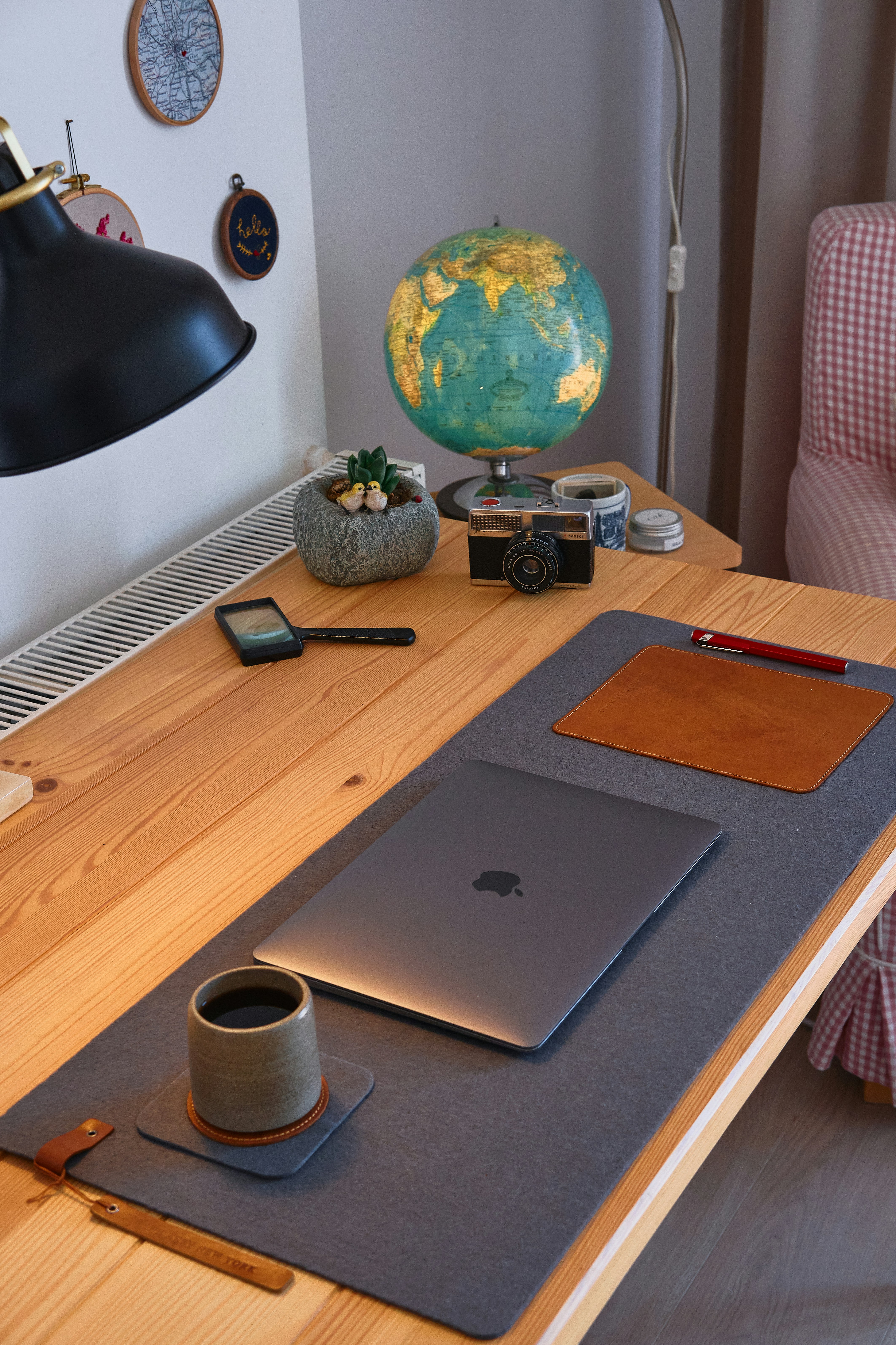 A desk with branding materials and designs