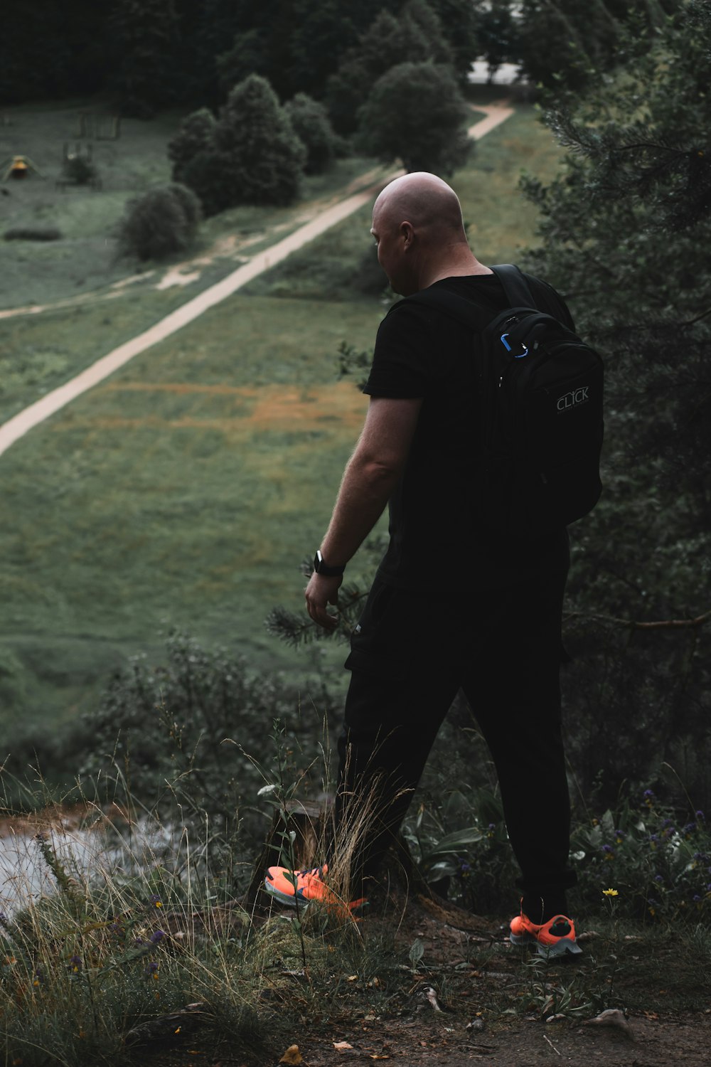 a man standing on a road