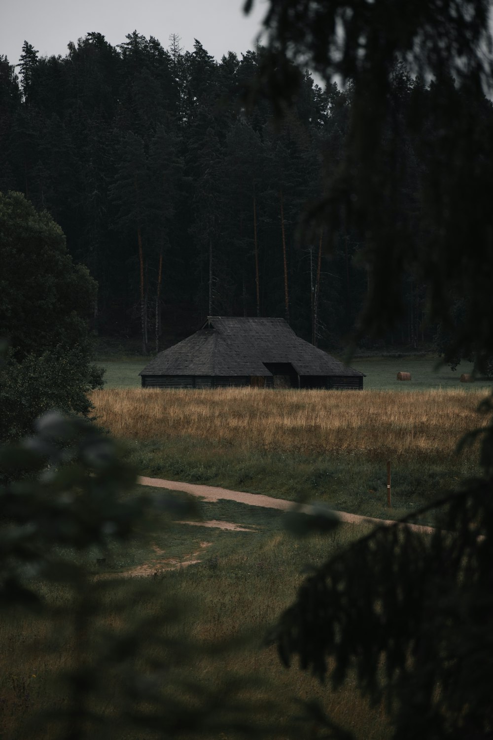 a small building in a field