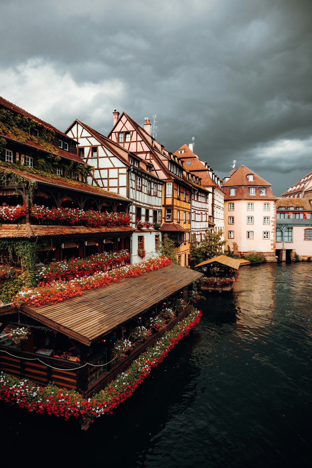 a bridge over a river with buildings on either side of it