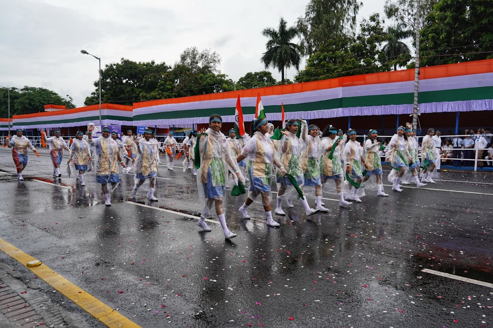 a group of people marching in a parade