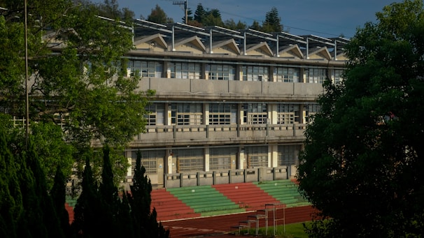 a building with a green lawn