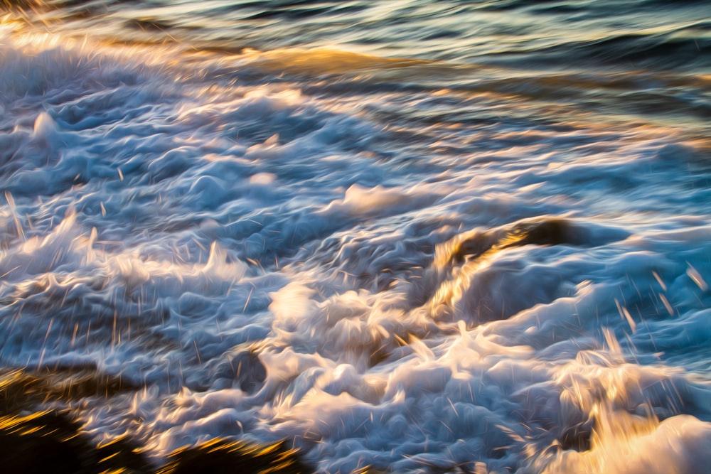 a body of water with waves