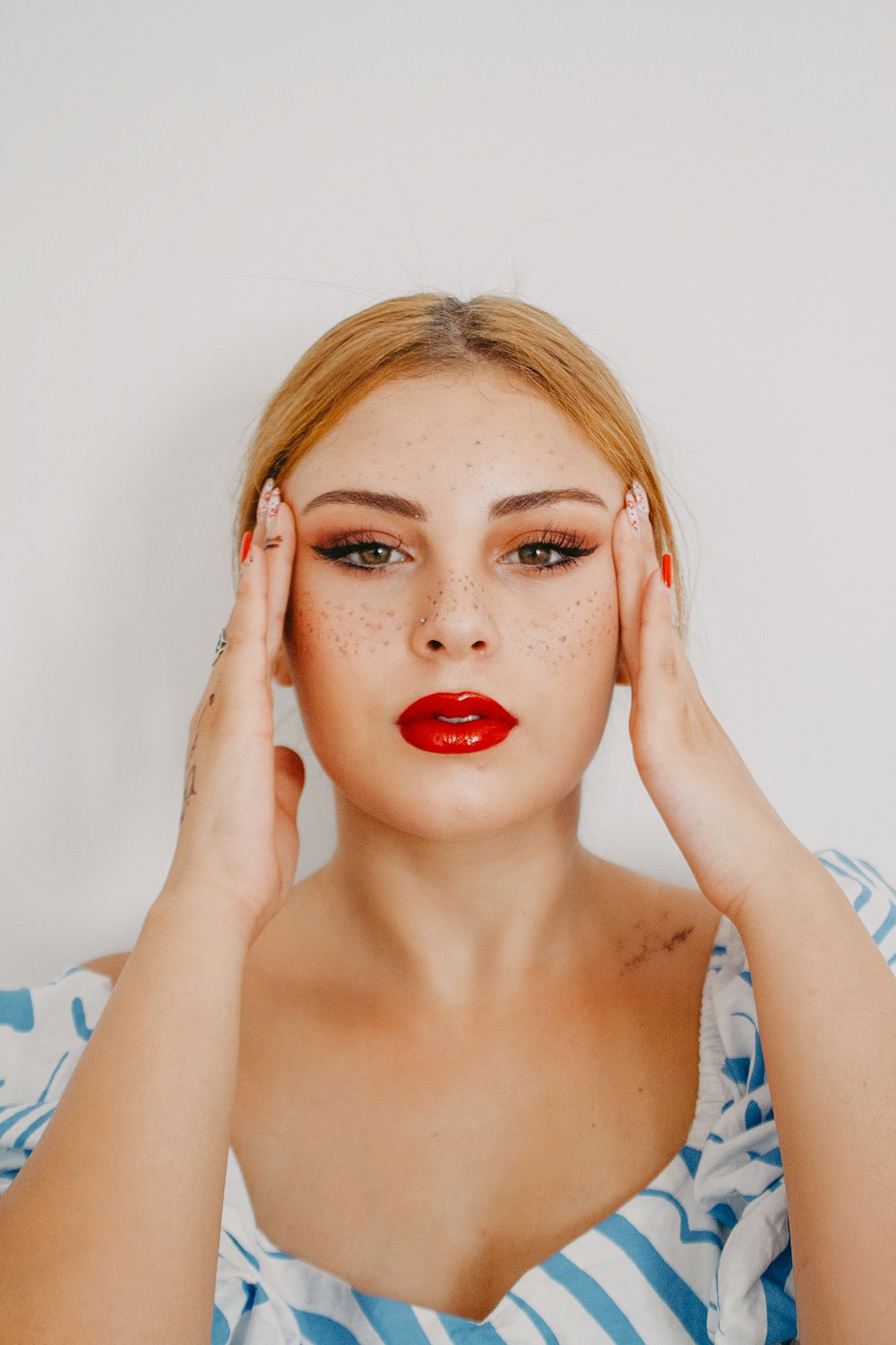 a person with red lipstick