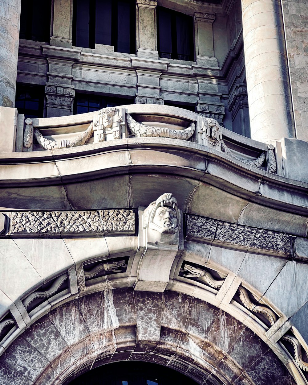 a statue on the side of a building